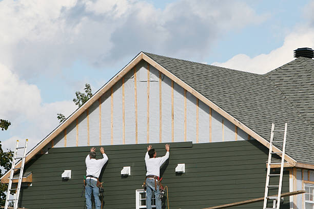 Professional Siding Installation technician working in Greer, SC